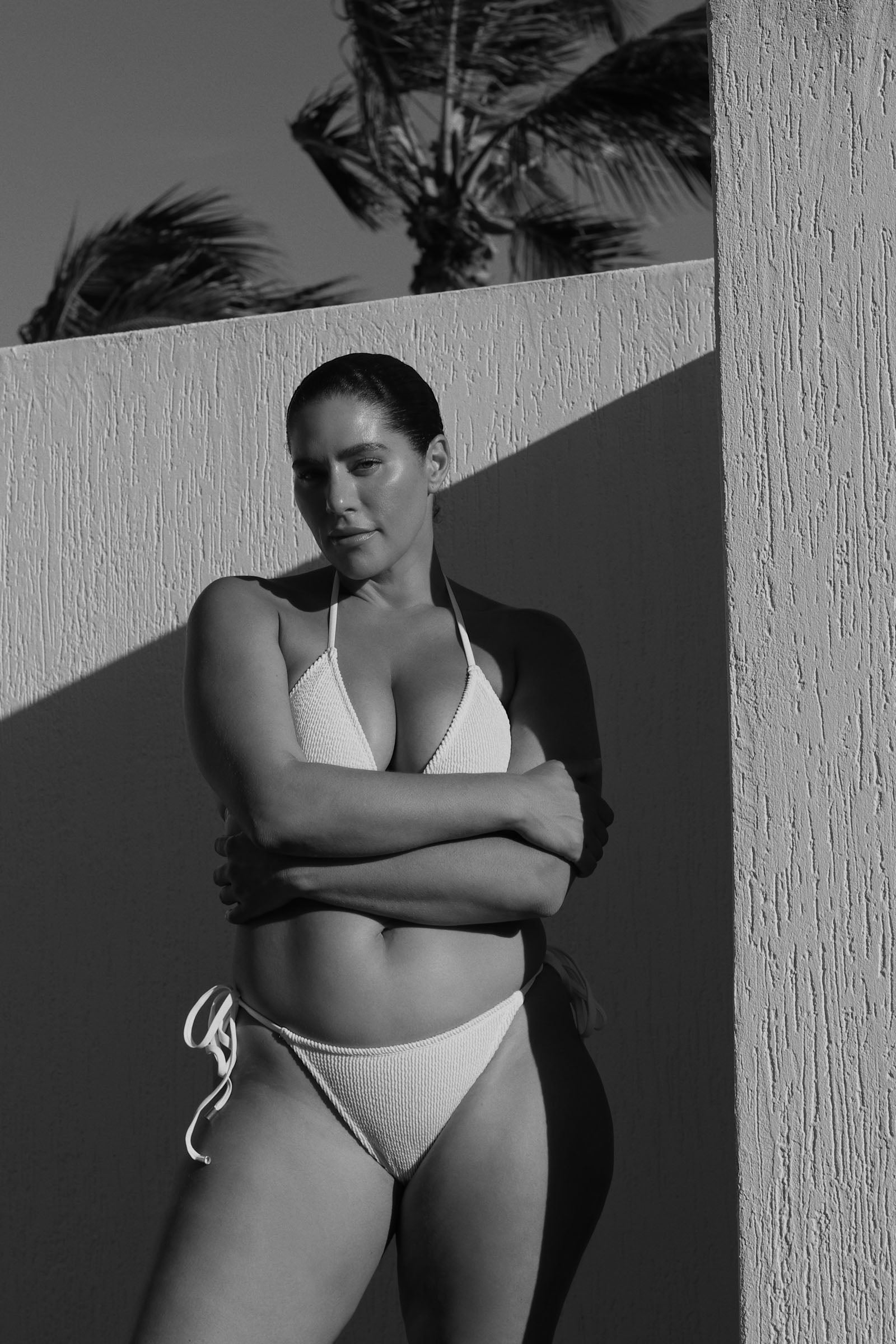 White textured tie side bikini bottom designed to fit and flatter curves.