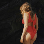 Red high-waisted, cheeky cut bikini bottom made from premium textured 5D fabric with power mesh lining to contour, sculpt and give superior support.