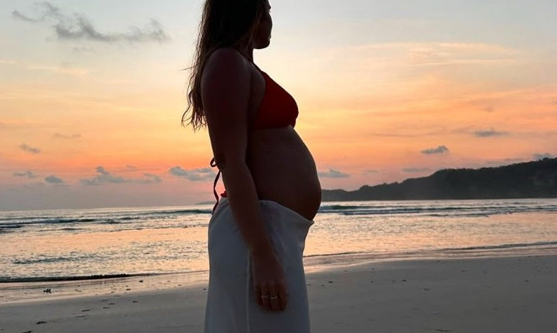 Bokumaia founder Bree McCann in red Olah bikini set at 28 weeks pregnant in Sumba, Indonesia