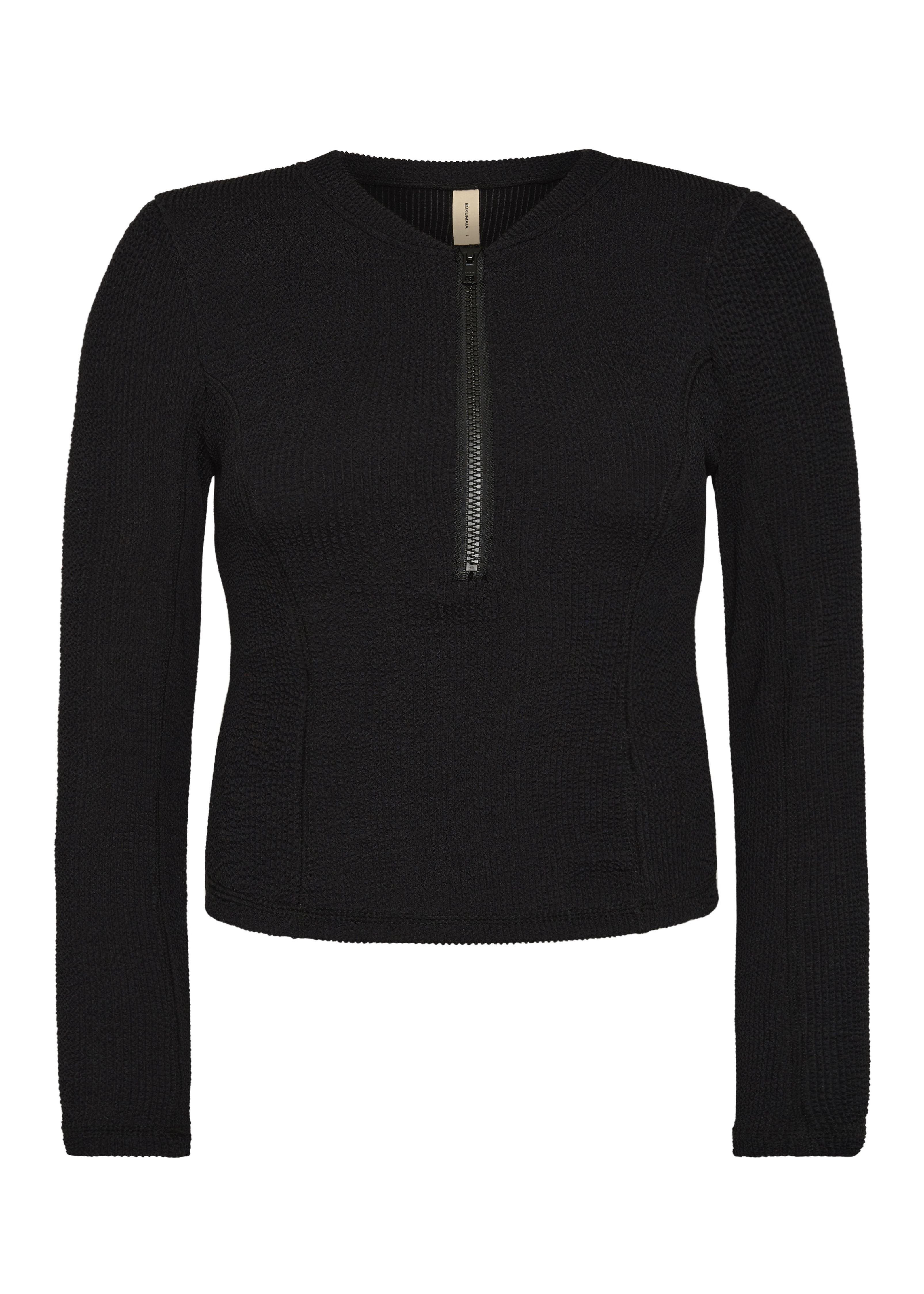 Bokumaia Zephyr black cropped rash vest, flat lay showing the centre front half zip