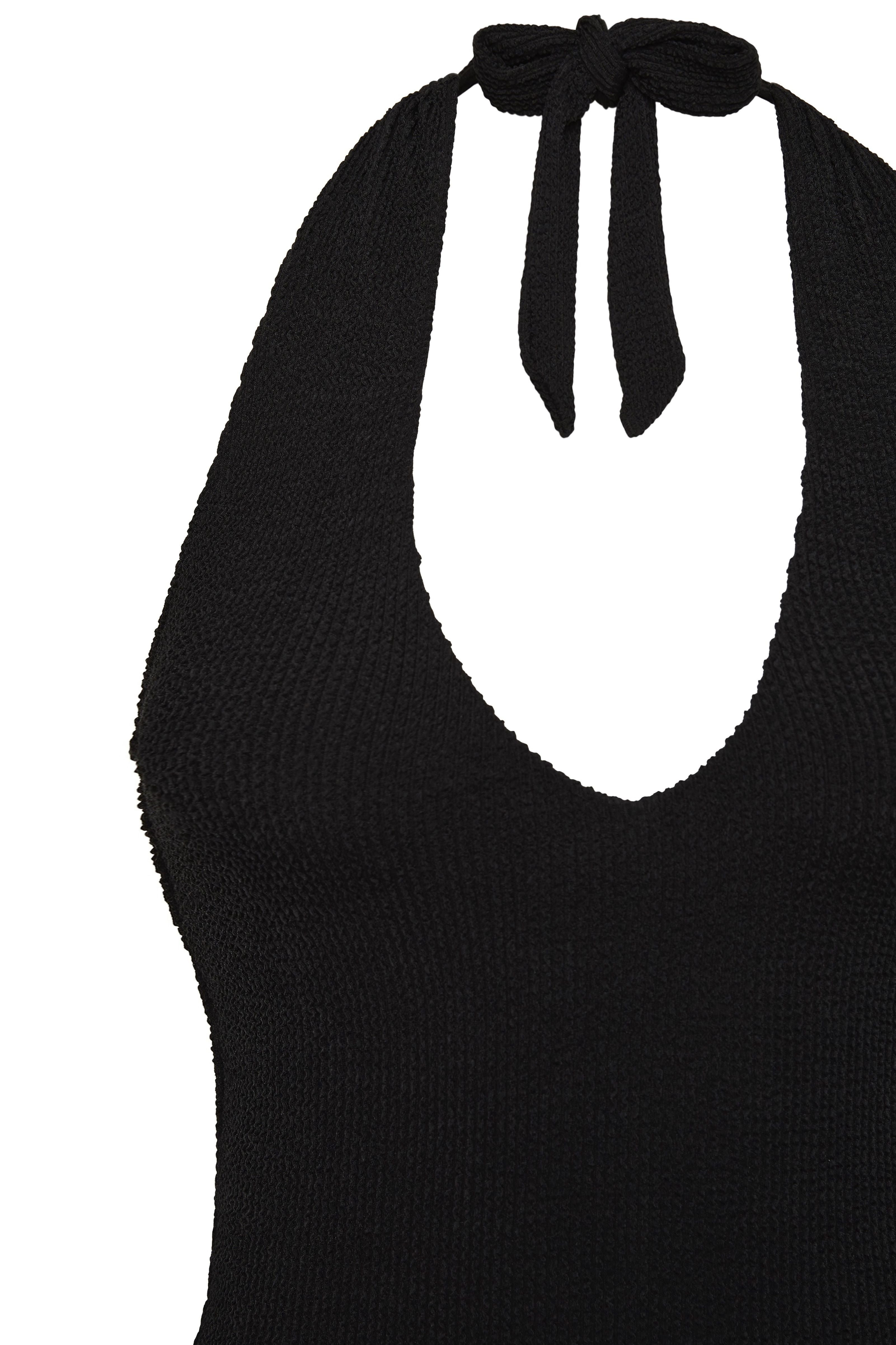 Flat lay of the black Haze swimsuit showing its halter tie and plunge V front