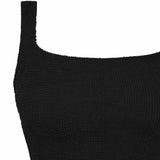 Flat lay detail of the black Sirena square neck tankini top and its shoulder strap