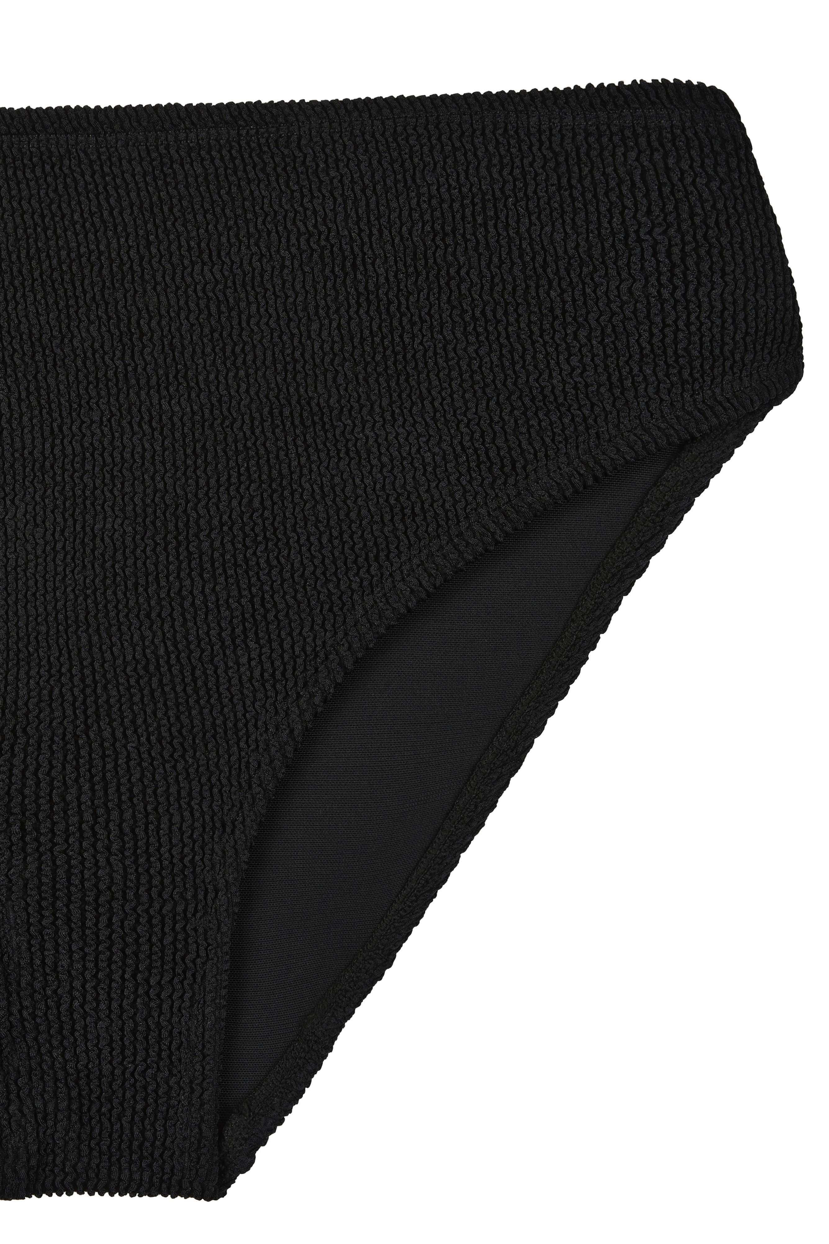 Flat lay back view of the black Sirena bikini bottoms with full seat coverage