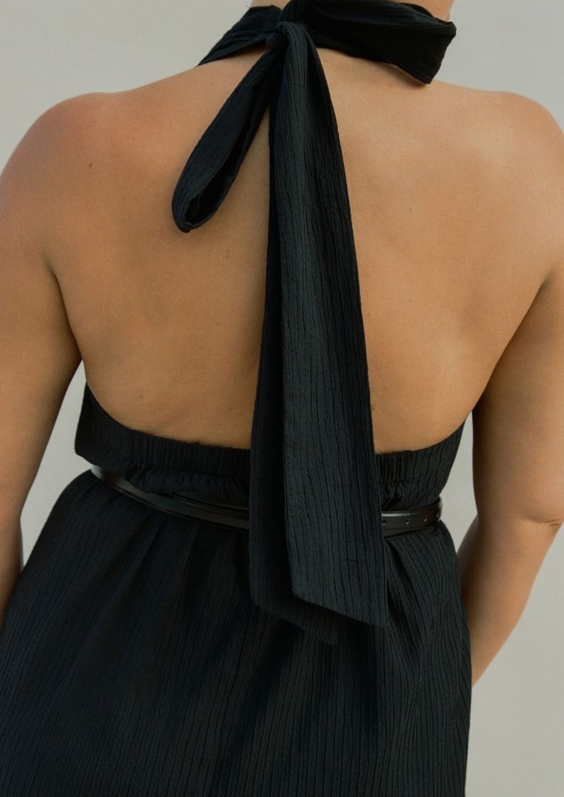 Back view of Bettina Midi Dress Black with open back and long halter tie