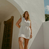 Blanca Mini Dress Ecru styled for coastal summer wear in textured linen
