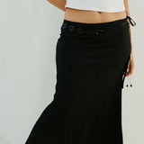 Dahlia Midi Skirt Black styled for beach to bar summer wear