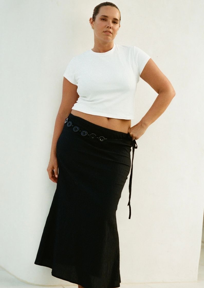 Dahlia Midi Skirt Black with minimal, flattering cut and side tie waist