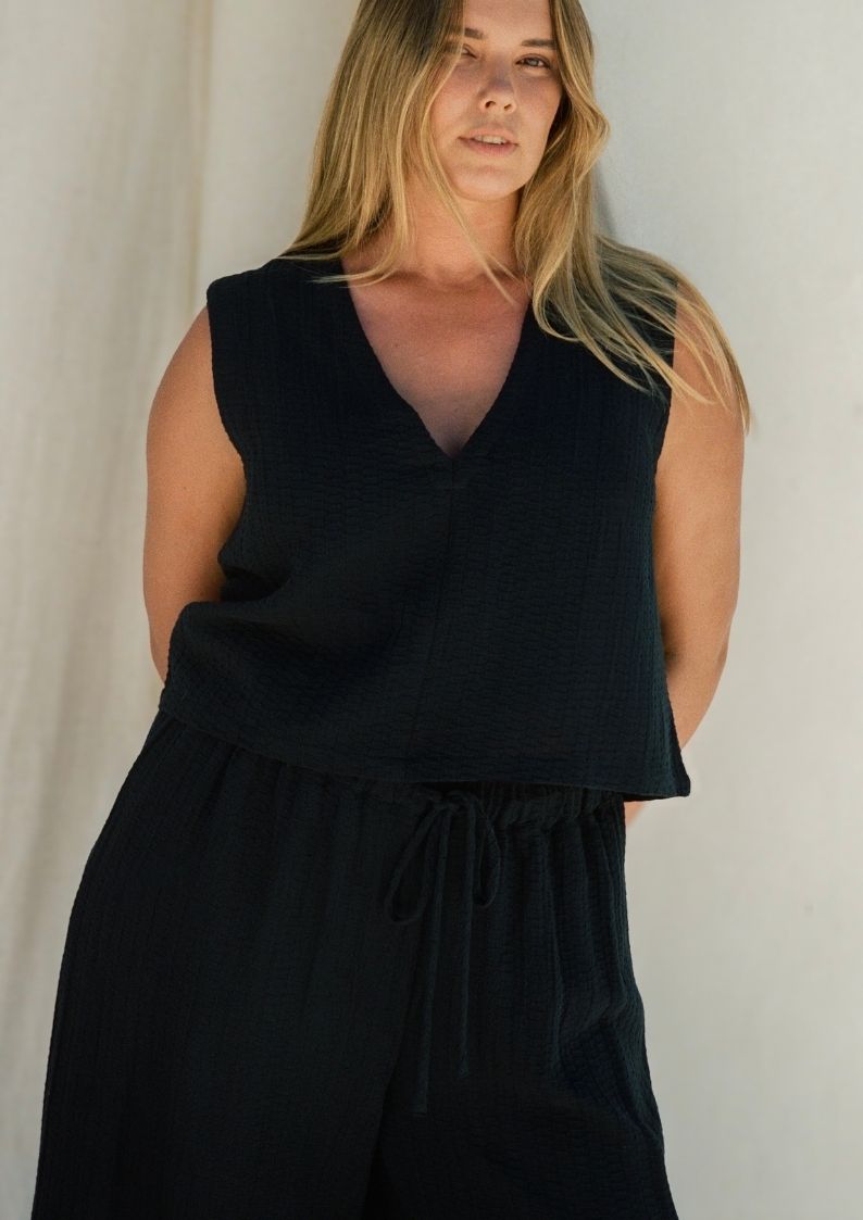 Echo Pant Black styled with Echo Tank for minimalist summer resort wear