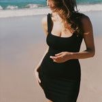 Black textured bodycon mini dress with inbuilt bra support, square neckline and a sleek, sculpting fit. 